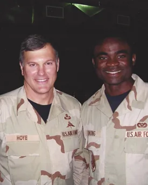 two male army smiling